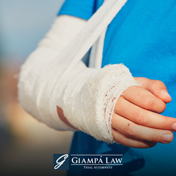 Person with their arm in a cast and sling after a New York personal injury caused by negligence